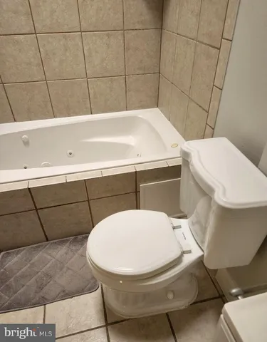 a bathroom with a sink and toilet