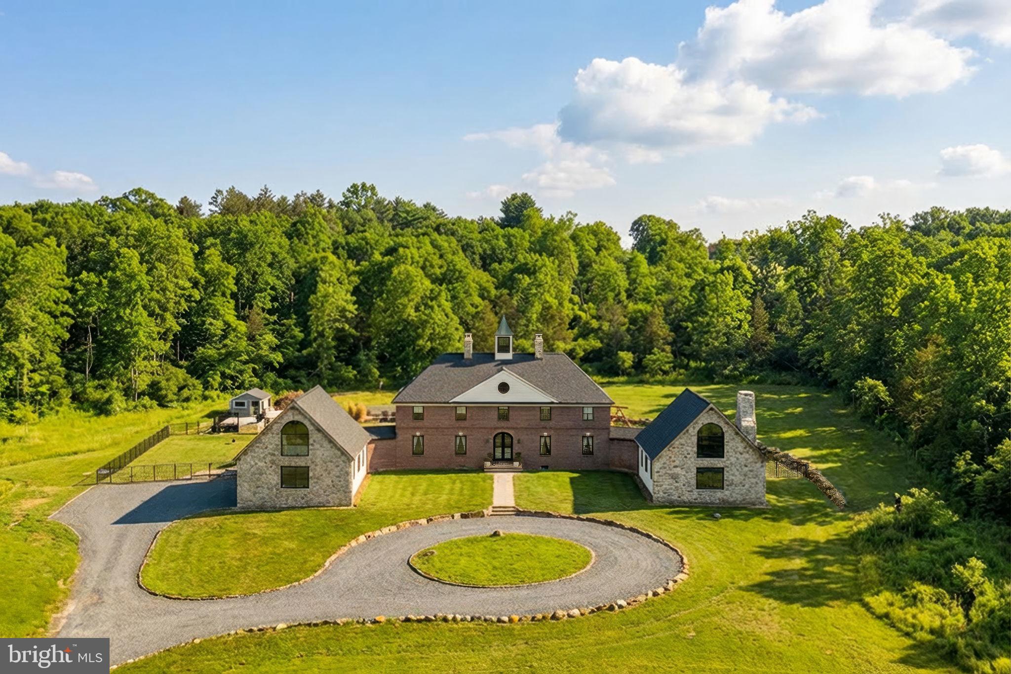 1400 Fairhill Road Sellersville, PA 18960 - Photo 1 of 41 a swimming pool with some trees in the background