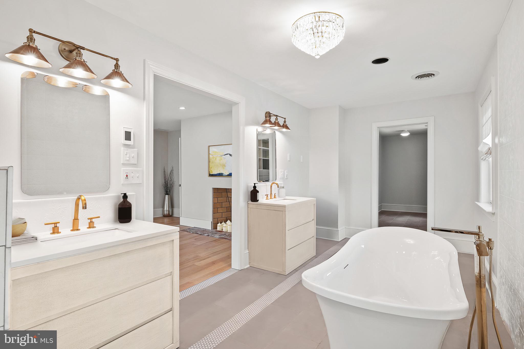 1400 Fairhill Road Sellersville, PA 18960 - Photo 23 of 41 a bathroom with a tub sink and a mirror
