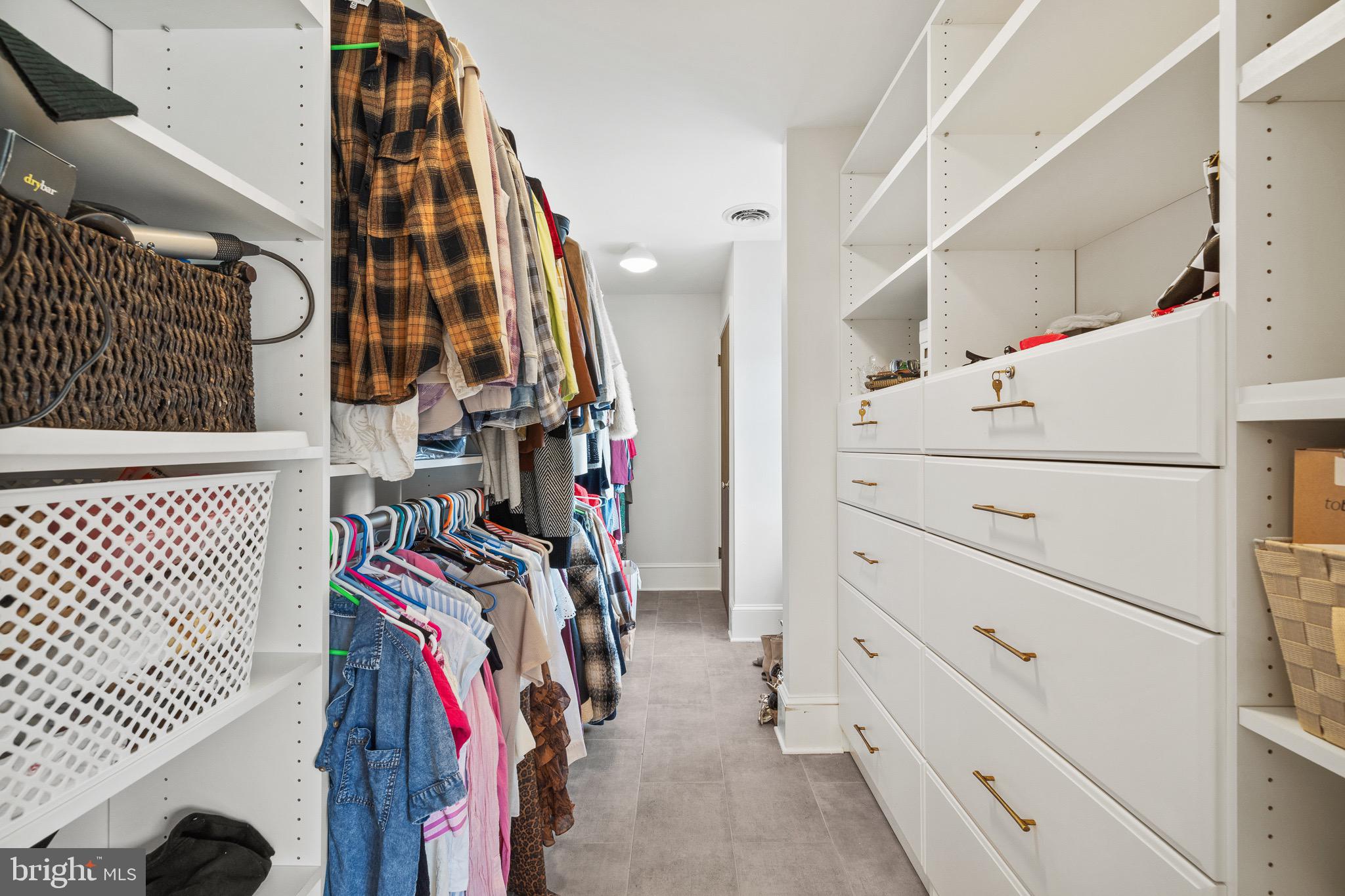 1400 Fairhill Road Sellersville, PA 18960 - Photo 25 of 41 a view of walk in closet with clothes