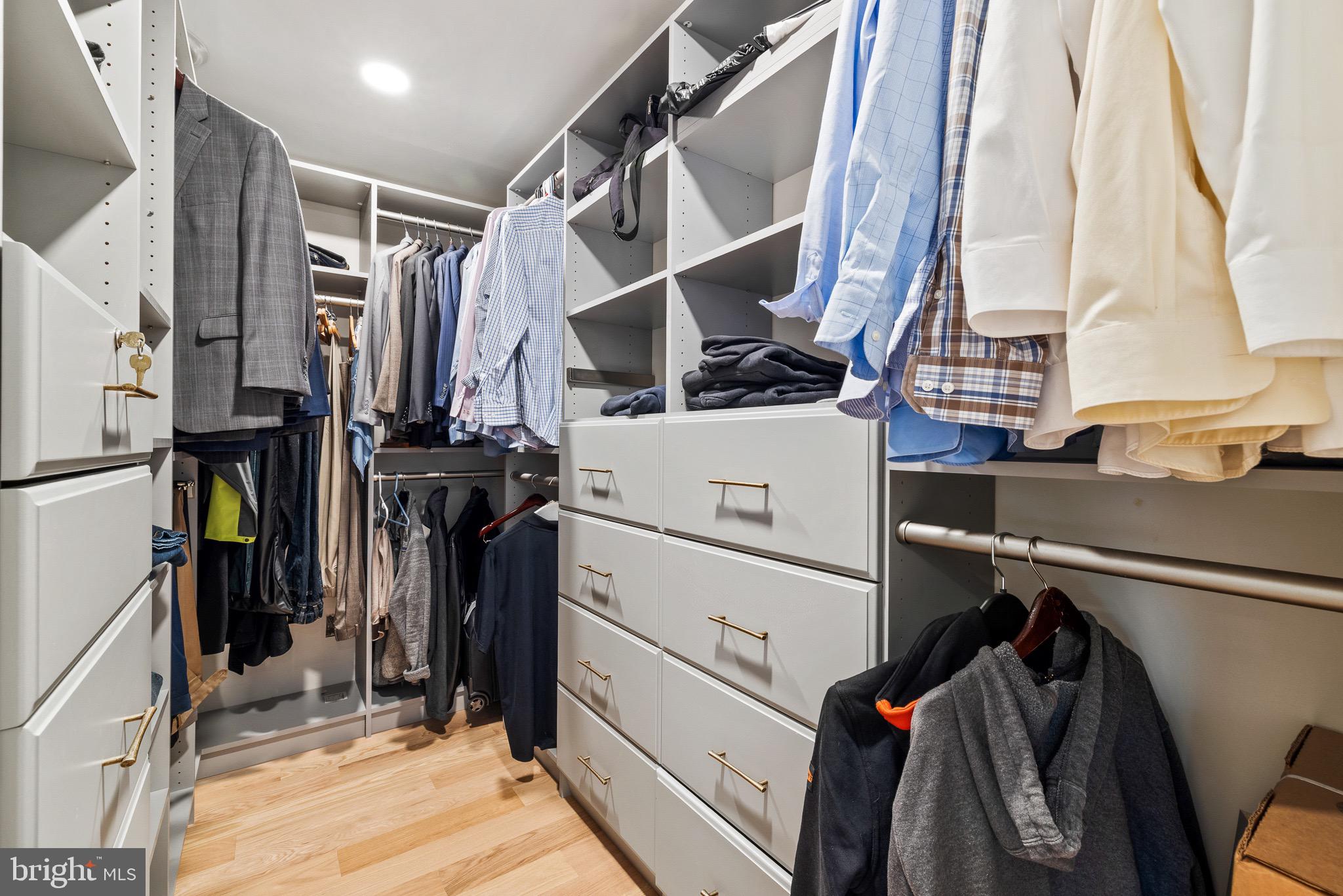 1400 Fairhill Road Sellersville, PA 18960 - Photo 26 of 41 a view of walk in closet with clothes and shoes