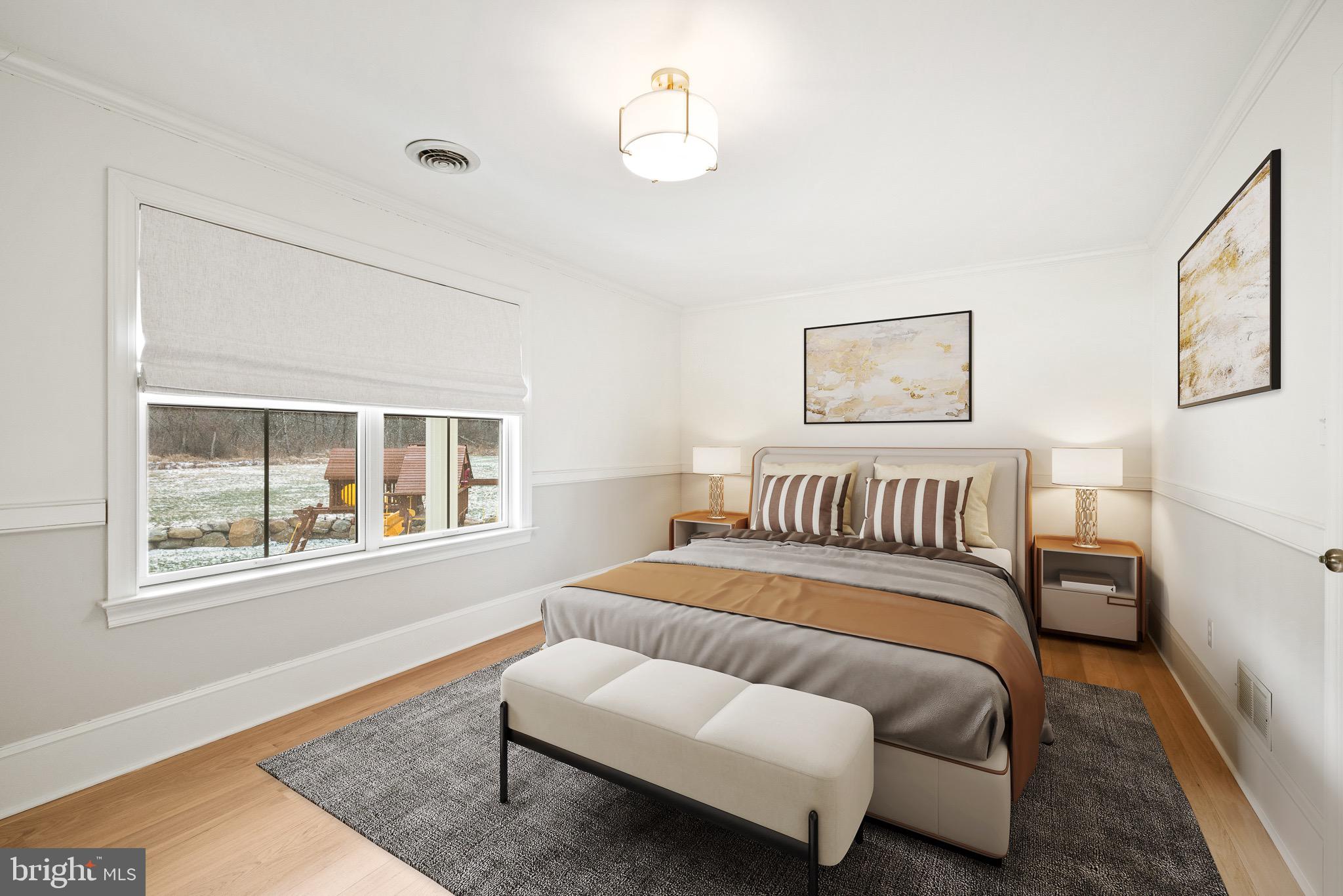 1400 Fairhill Road Sellersville, PA 18960 - Photo 27 of 41 a bedroom with a bed couch and window