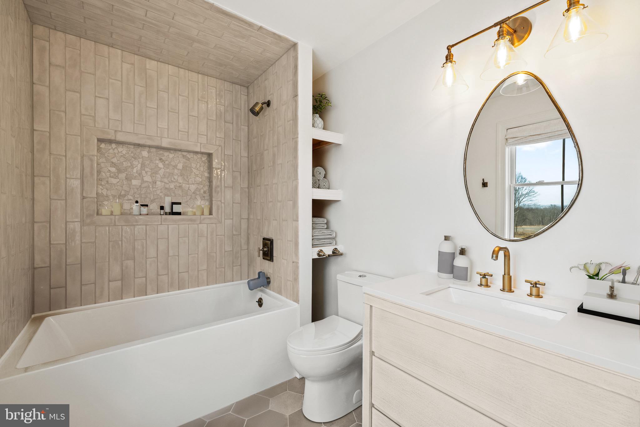 1400 Fairhill Road Sellersville, PA 18960 - Photo 29 of 41 a bathroom with a sink a toilet and a mirror