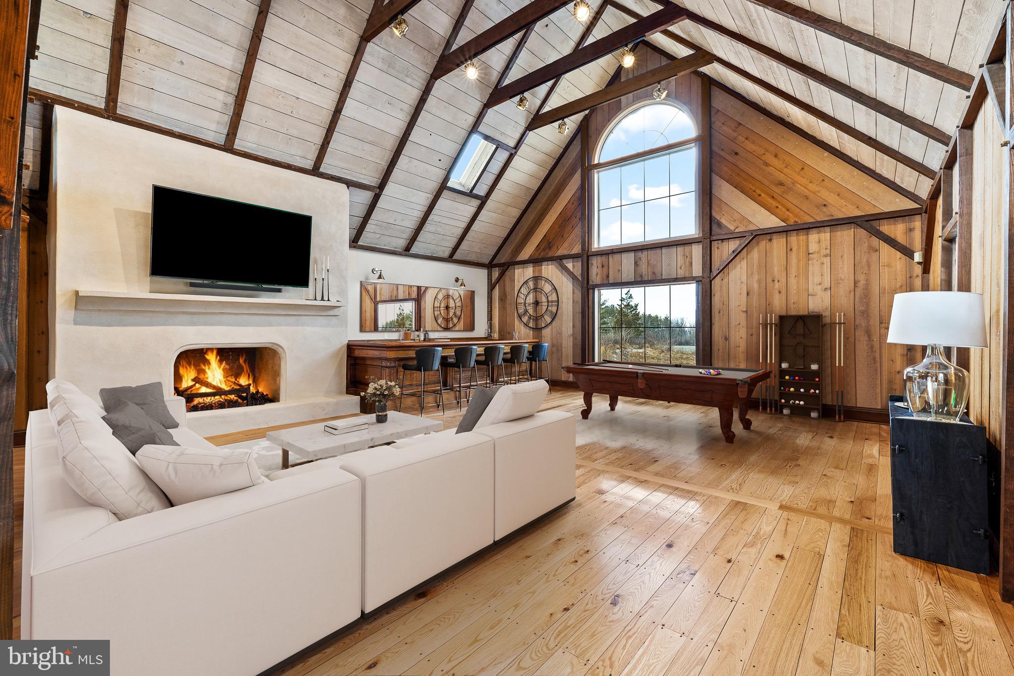 1400 Fairhill Road Sellersville, PA 18960 - Photo 37 of 41 a living room with furniture a flat screen tv and a fireplace