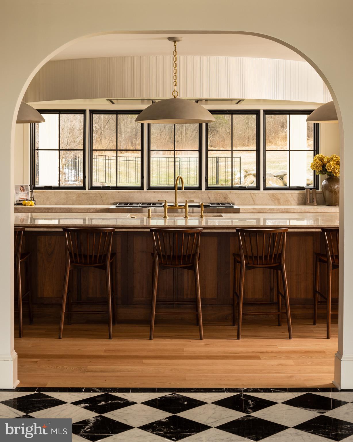 1400 Fairhill Road Sellersville, PA 18960 - Photo 7 of 41 a kitchen with a stove a sink and wooden cabinets