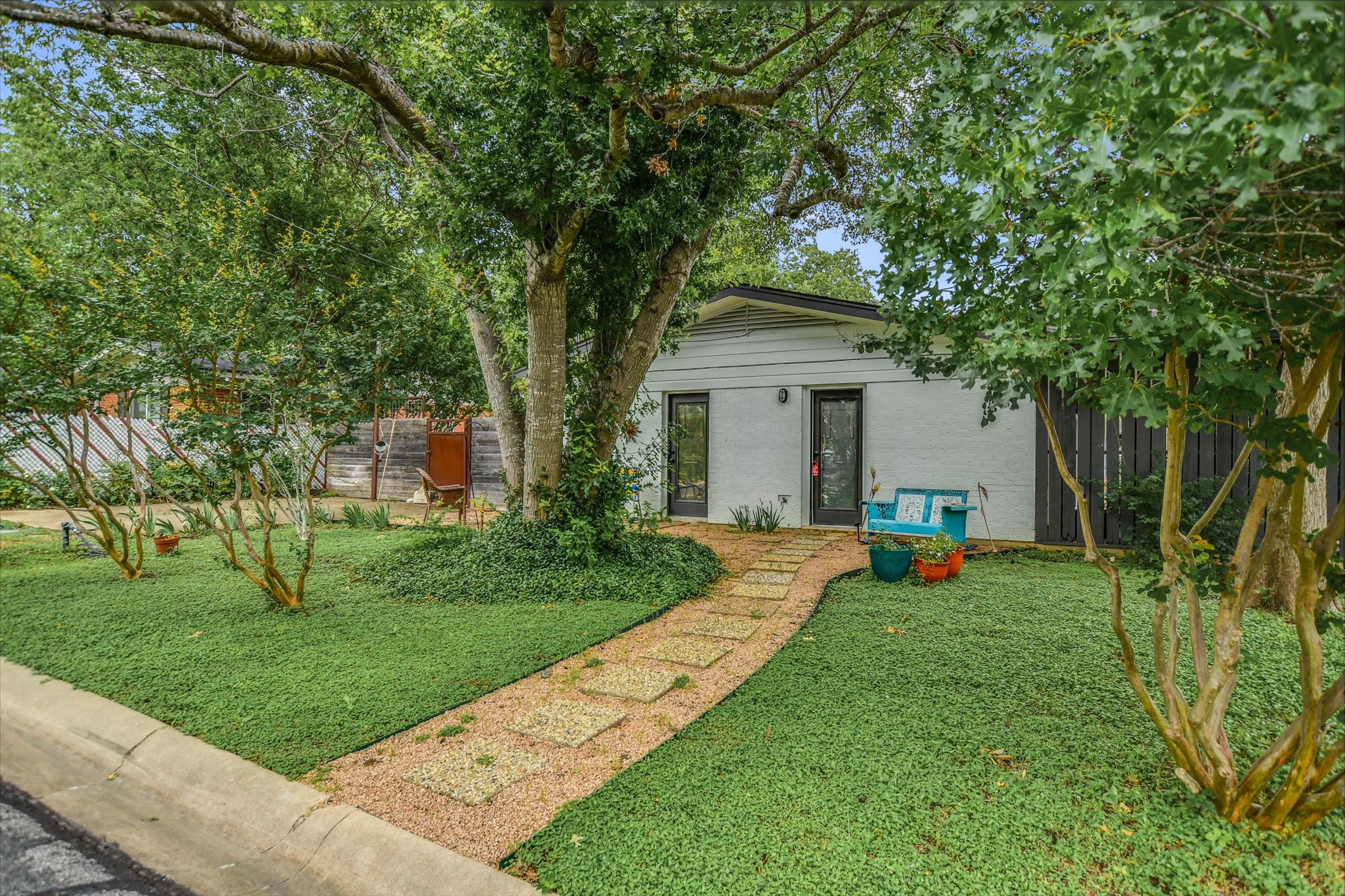 1601 East 19th Street Georgetown, TX 78626 - Photo 26 of 31 a front view of a house with garden