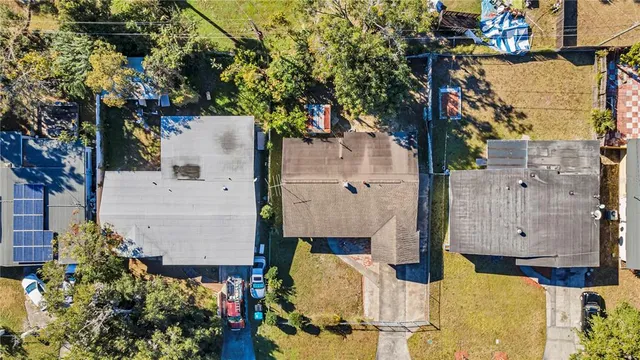 an aerial view of a house having yard