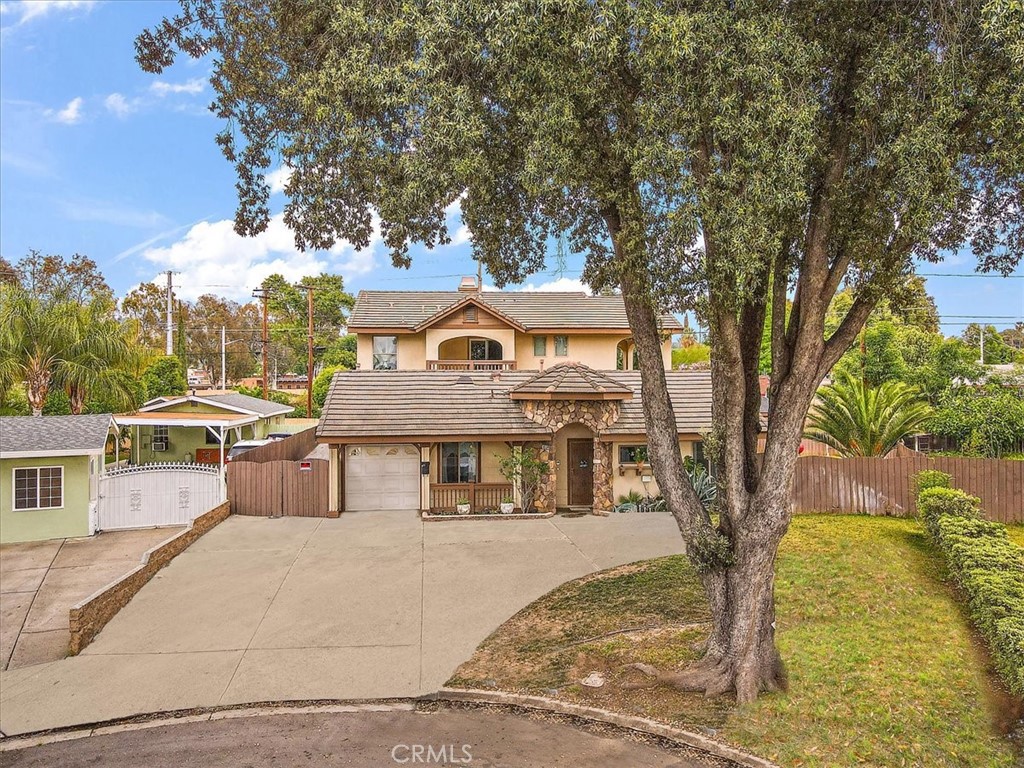 6530 Harley Street Riverside, CA 92506 - Photo 1 of 1 a front view of a house with a yard