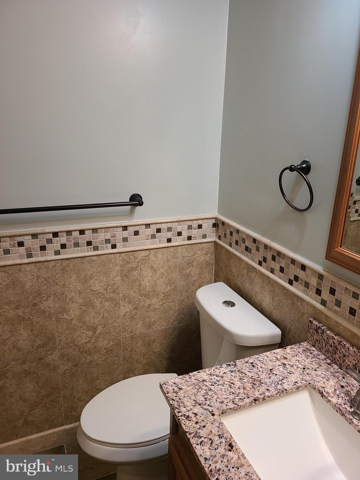 7922 Pebble Brook Court Springfield, VA 22153 - Photo 21 of 26 Custom tilework in upstairs hall bath