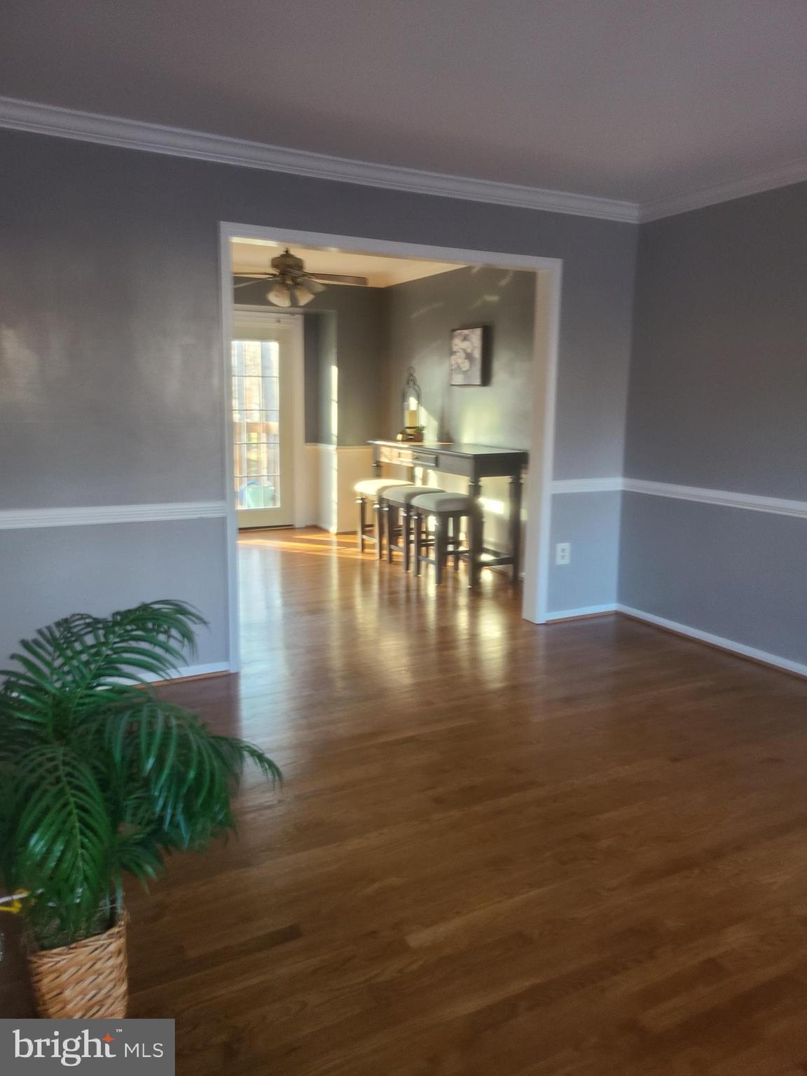 7922 Pebble Brook Court Springfield, VA 22153 - Photo 9 of 26 View from foyer through living room to dining room