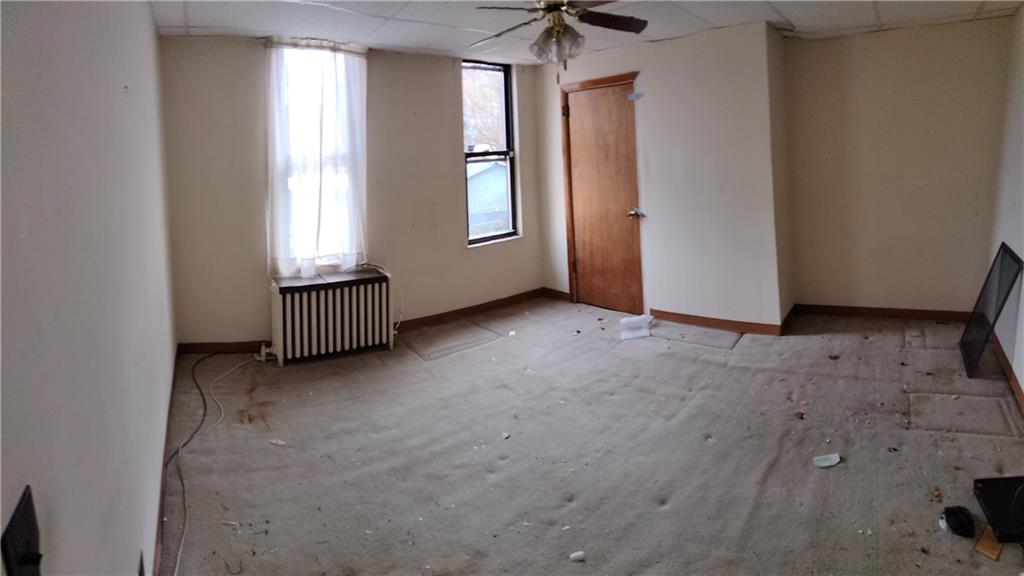522 Freeland Street Pittsburgh, PA 15210 - Photo 12 of 19 an empty room with windows