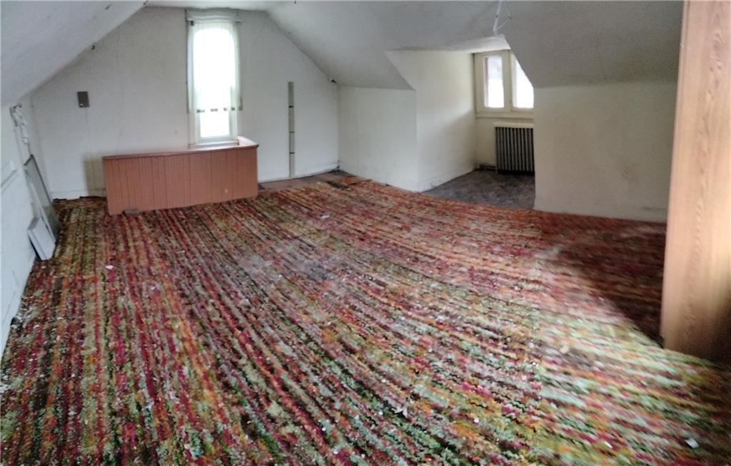 522 Freeland Street Pittsburgh, PA 15210 - Photo 14 of 19 an empty room with windows