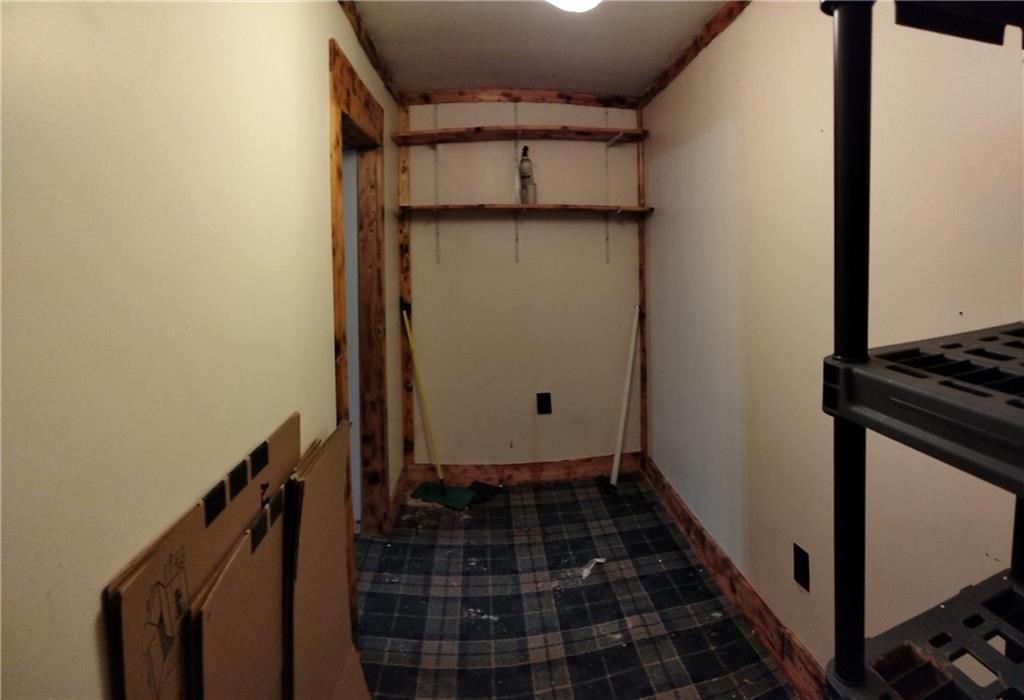 522 Freeland Street Pittsburgh, PA 15210 - Photo 16 of 19 a view of a door and wooden floor