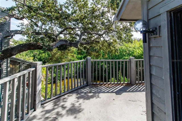a view of a fence from a balcony