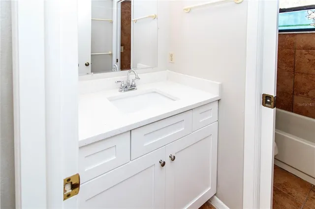 a bathroom with a sink and a toilet
