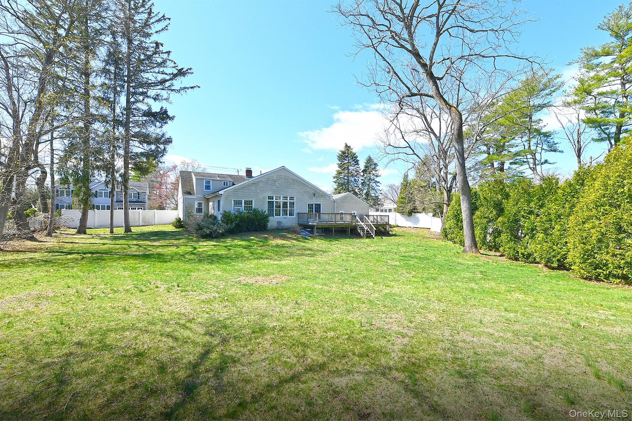86 Horton Place Syosset, NY 11791 - Photo 21 of 22 a view of a house with yard and sitting area