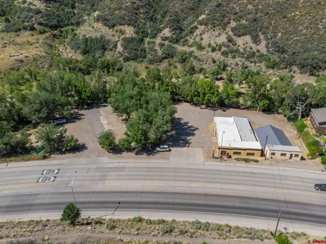 an aerial view of a house with a garden