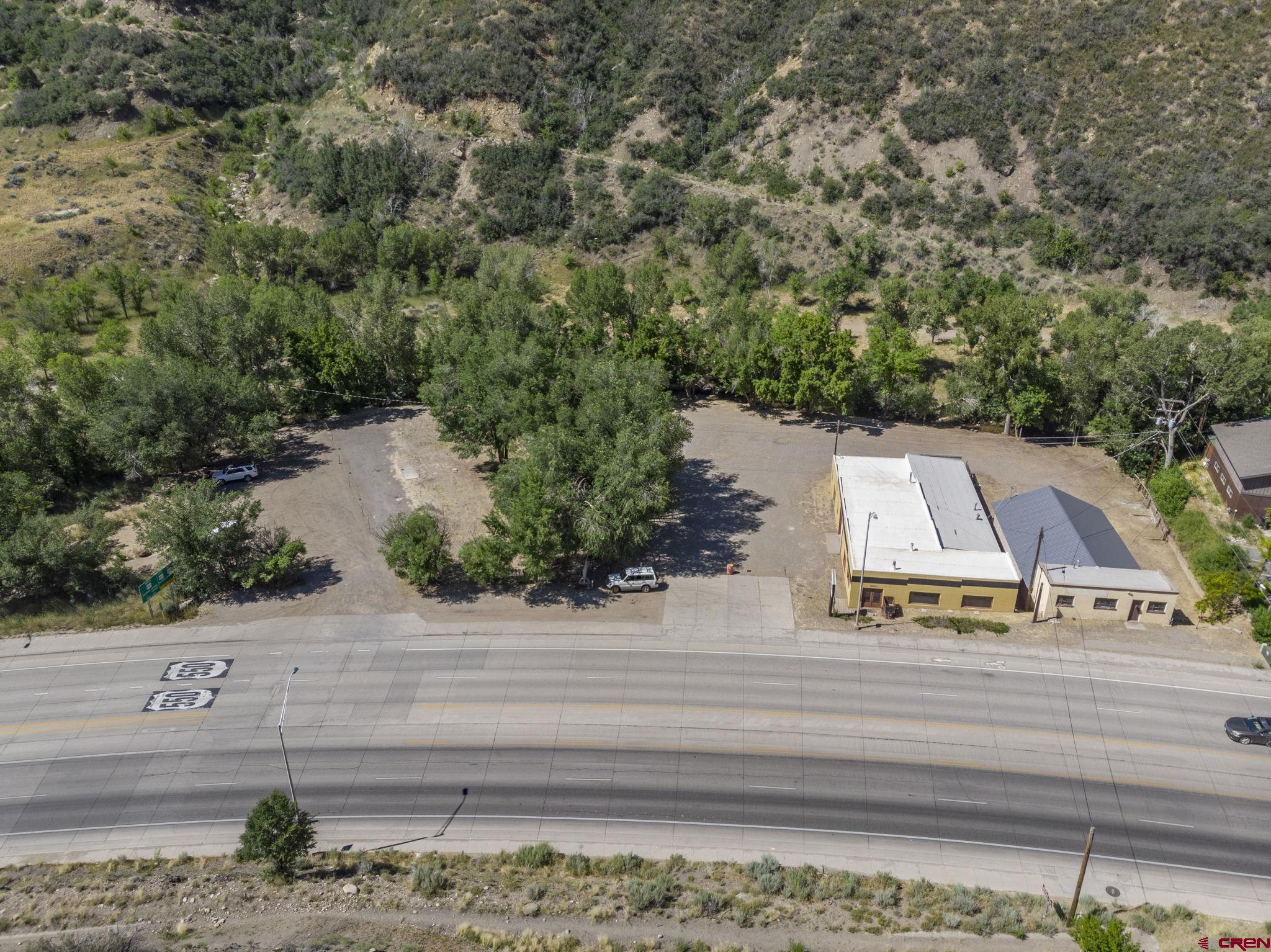 an aerial view of a house with a garden
