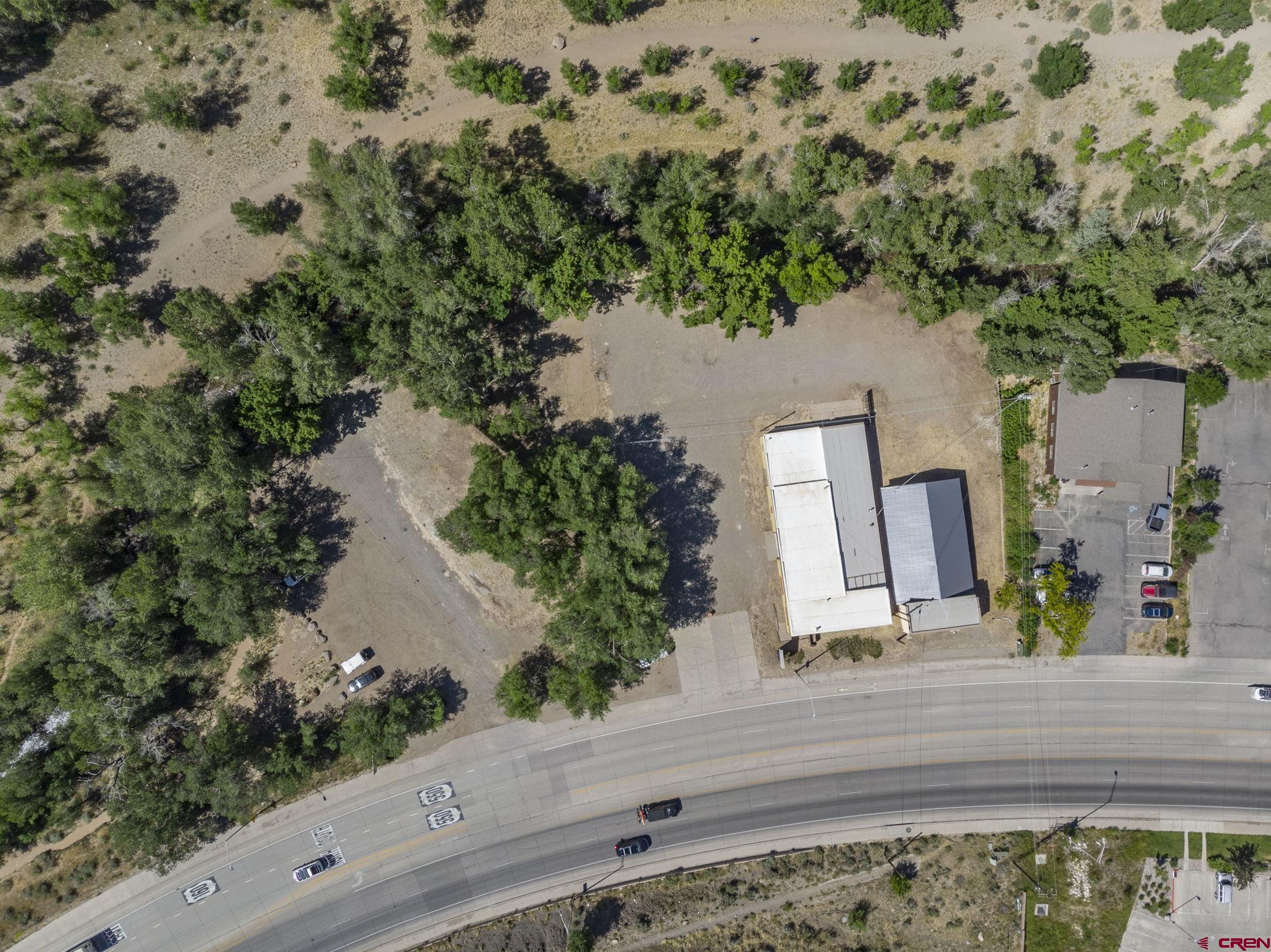 4 West Us Highway Durango, CO 81303 - Photo 3 of 23 an aerial view of a house with a yard and sitting area