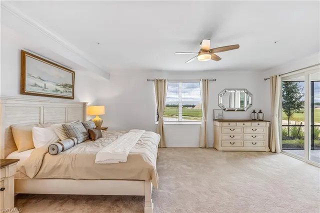 a bedroom with bed and window