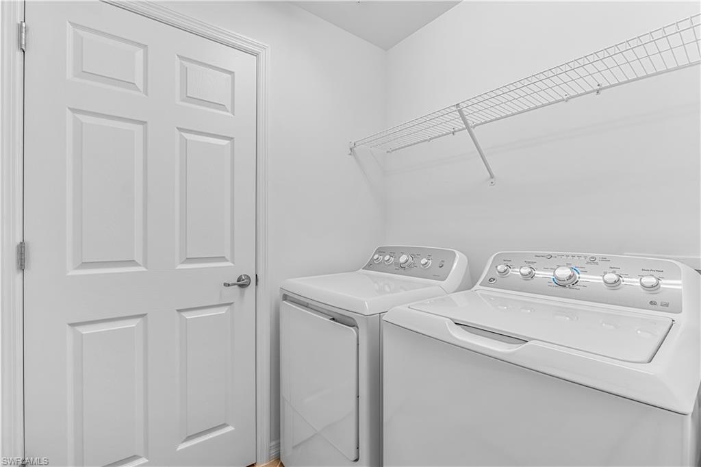 15943 Grassland Lane, Unit 3912 Babcock Ranch, FL 33982 - Photo 17 of 20 a utility room with dryer and washer