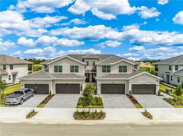 a view of a city with an ocean