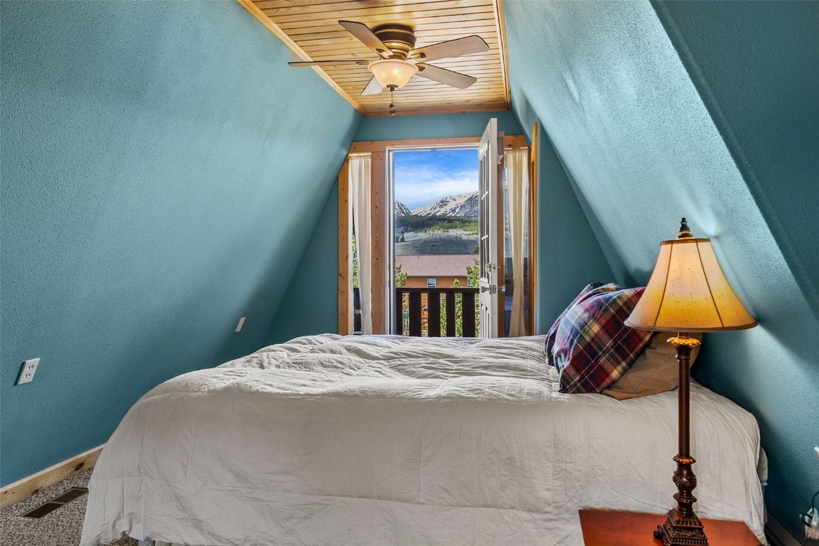 367 G Road Silverthorne, CO 80498 - Photo 28 of 50 a bedroom with a bed and a window