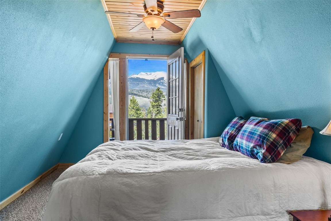 367 G Road Silverthorne, CO 80498 - Photo 30 of 50 a bedroom with a bed and a window