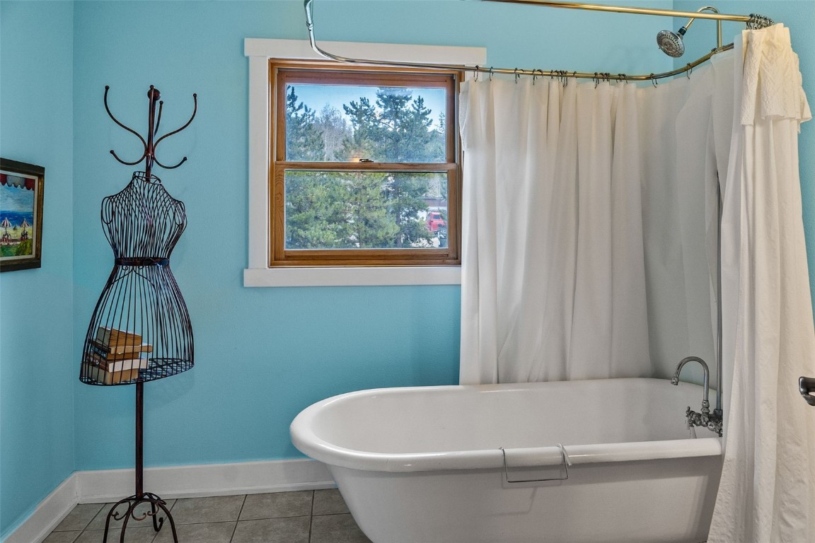 367 G Road Silverthorne, CO 80498 - Photo 31 of 50 a white bath tub sitting next to a white shower