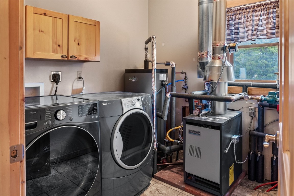 367 G Road Silverthorne, CO 80498 - Photo 32 of 50 a view of workspace with washer and dryer