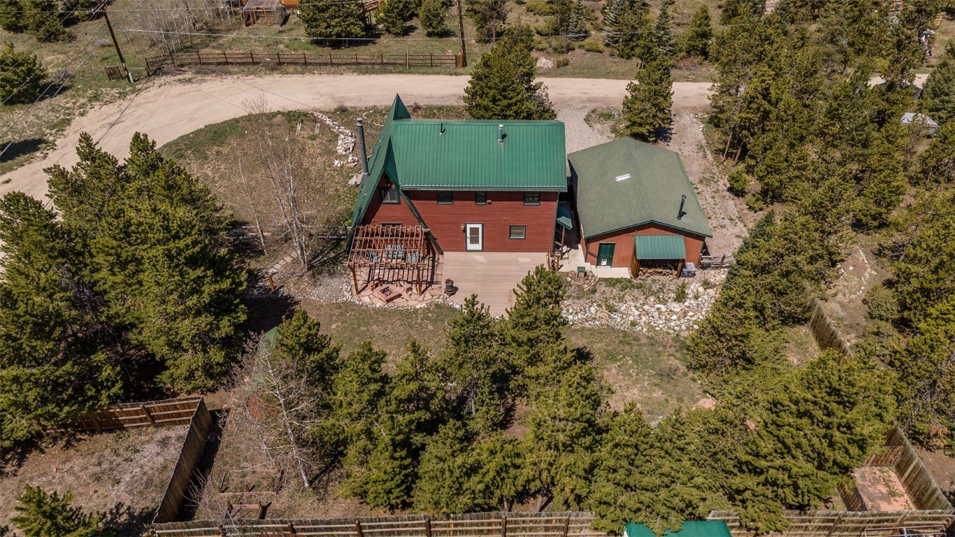 367 G Road Silverthorne, CO 80498 - Photo 44 of 50 an aerial view of a house with outdoor space and a lake view