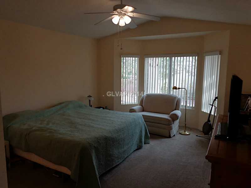 490 Edgefield Ridge Place Henderson, NV 89012 - Photo 10 of 18 Master Bedroom. OPEN AND BRIGHT MASTER BEDROOM