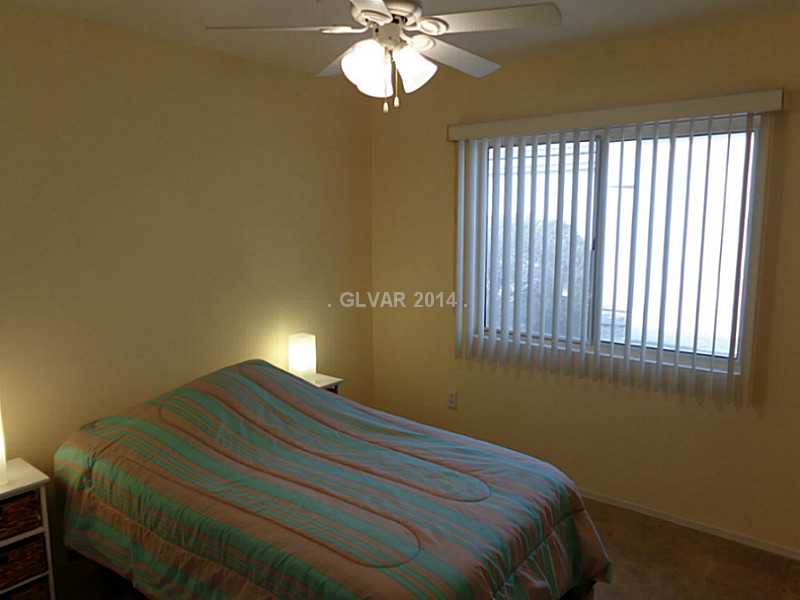 490 Edgefield Ridge Place Henderson, NV 89012 - Photo 13 of 18 Bedroom. GUEST BEDROOM WITH FAN