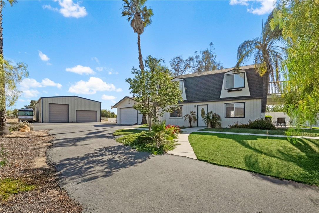 35825 Meadow Ridge Road Temecula, CA 92592 - Photo 30 of 75 a front view of a house with garden