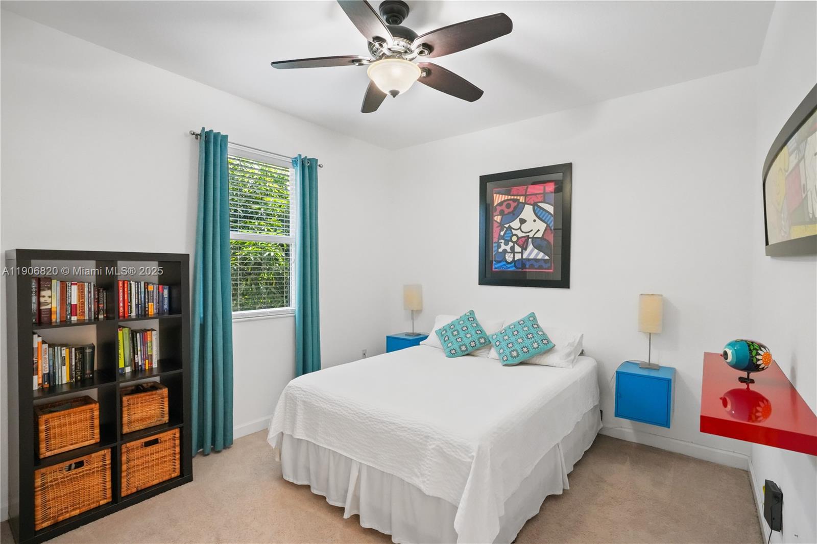 9127 Southwest 171st Court Miami, FL 33196 - Photo 19 of 54 a bedroom that has a bed and a book shelf