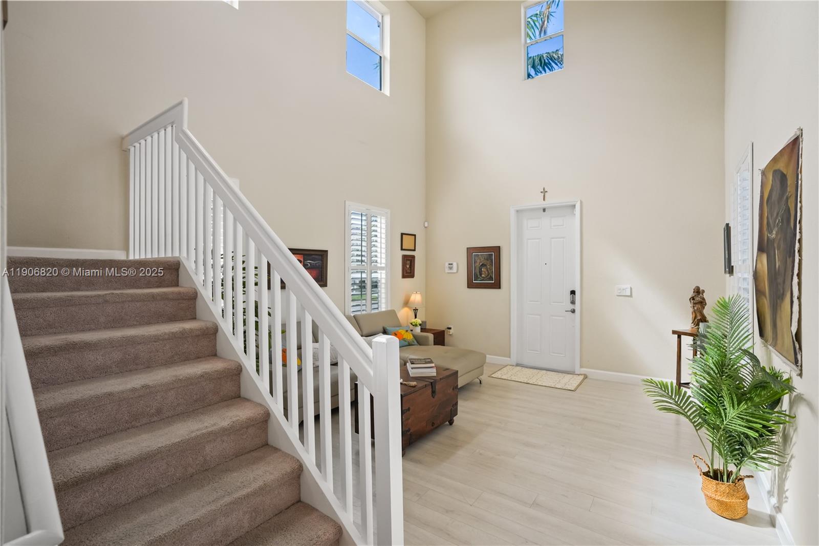 9127 Southwest 171st Court Miami, FL 33196 - Photo 28 of 54 a view of entryway with livingroom
