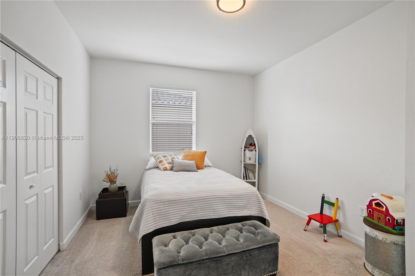 9127 Southwest 171st Court Miami, FL 33196 - Photo 35 of 54 a bed room with a bed and a couch