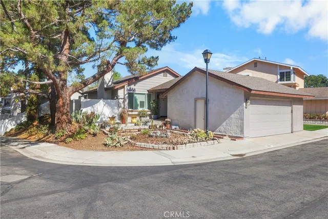a view of a house with a sink and yard