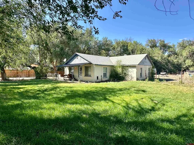 a house view with a garden space