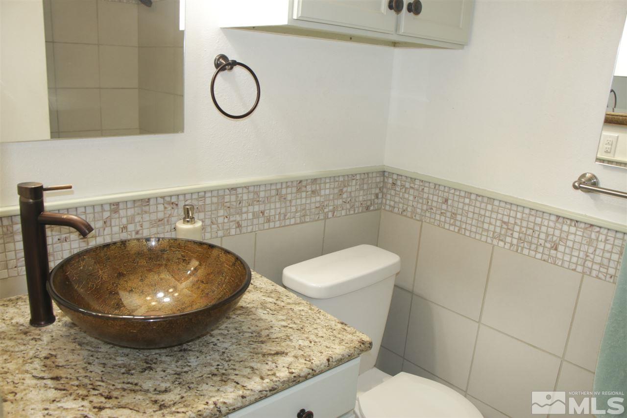 4100 Lakeside Drive Reno, NV 89509 - Photo 13 of 21 a bathroom with a toilet and a sink