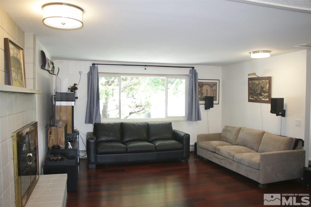 4100 Lakeside Drive Reno, NV 89509 - Photo 18 of 21 a living room with furniture and a large window