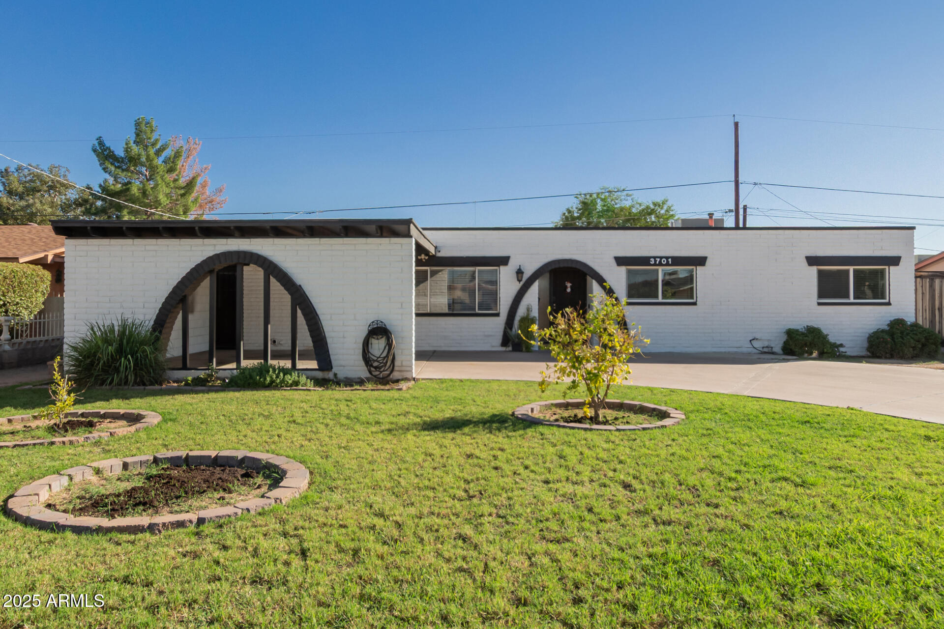 a house view with a garden space
