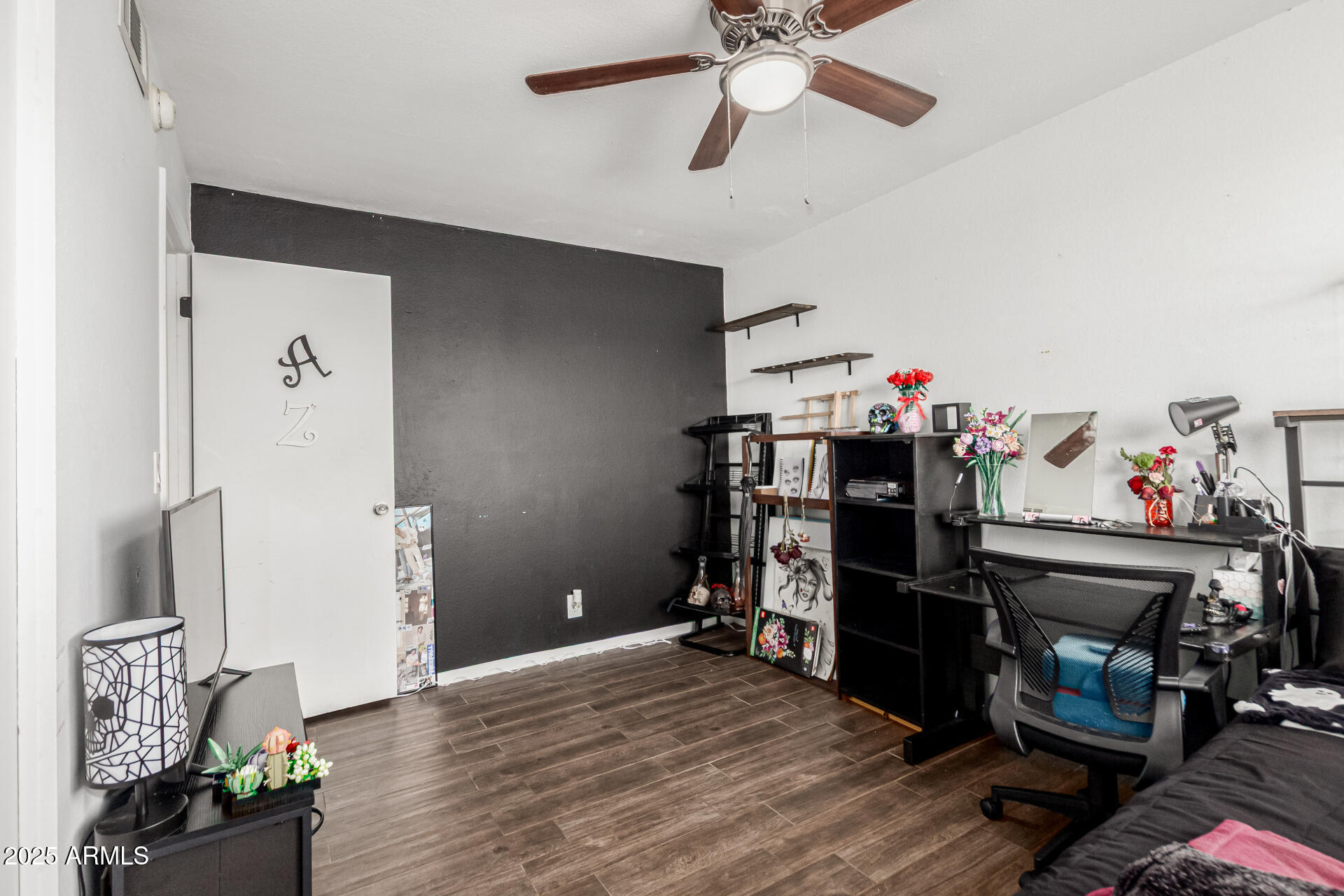 3701 West Griswold Road Phoenix, AZ 85051 - Photo 23 of 30 a view of a workspace with furniture