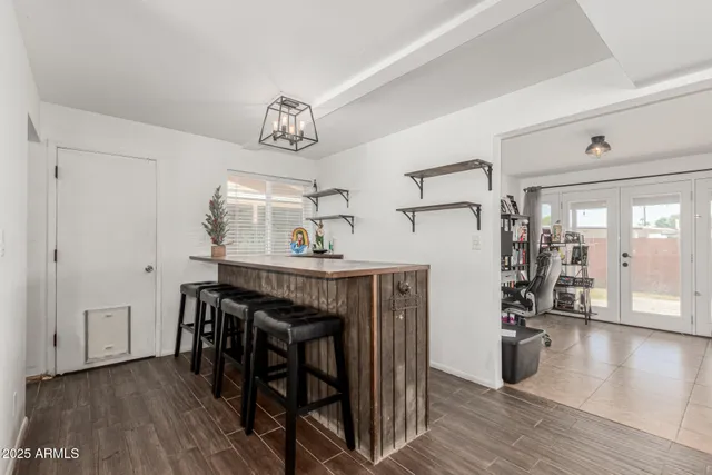 a view of a livingroom with furniture and wooden floor