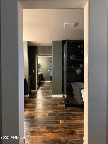 a view of a living room and bathroom