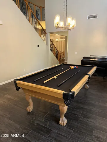 a kitchen with granite countertop a stove and a refrigerator