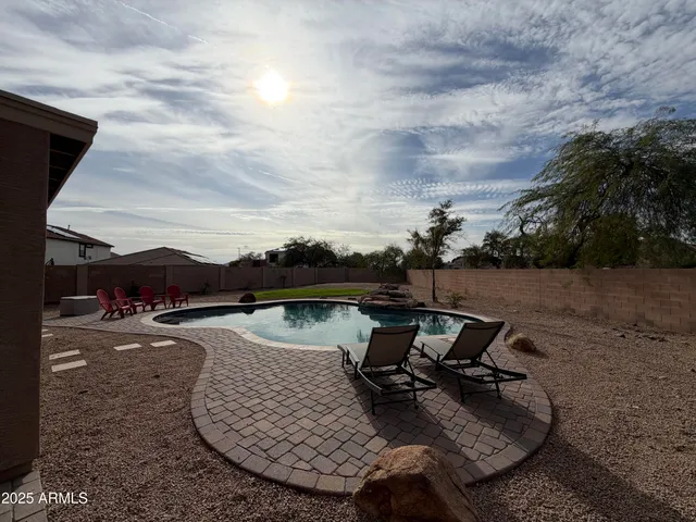 a view of a hallway with washer and dryer