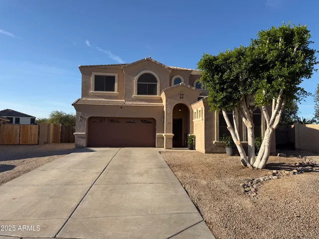 a view of a backyard with a patio