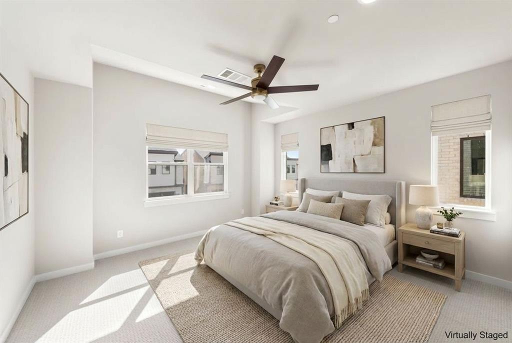2013 Aldrich Road Celina, TX 75009 - Photo 30 of 40 a bedroom with a bed and a chandelier