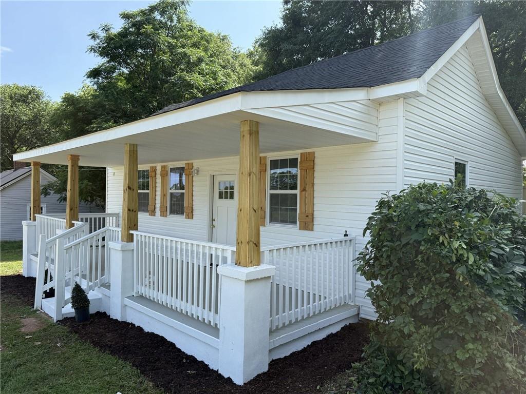 1300 Murphy Avenue LaGrange, GA 30240 - Photo 1 of 24 a view of a white house with a small yard and deck